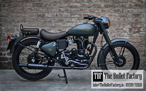 Customised Bullet 350 in matte green paint, custom seats and black powder-coated engine